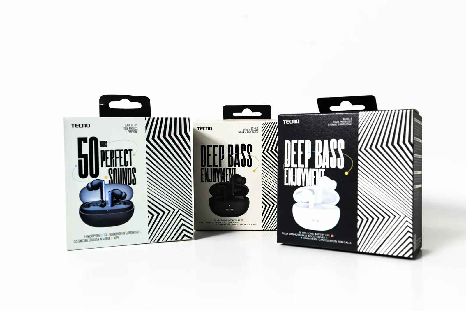 TECNO earbuds boxes with black hanging tabs and black-and-white line pattern