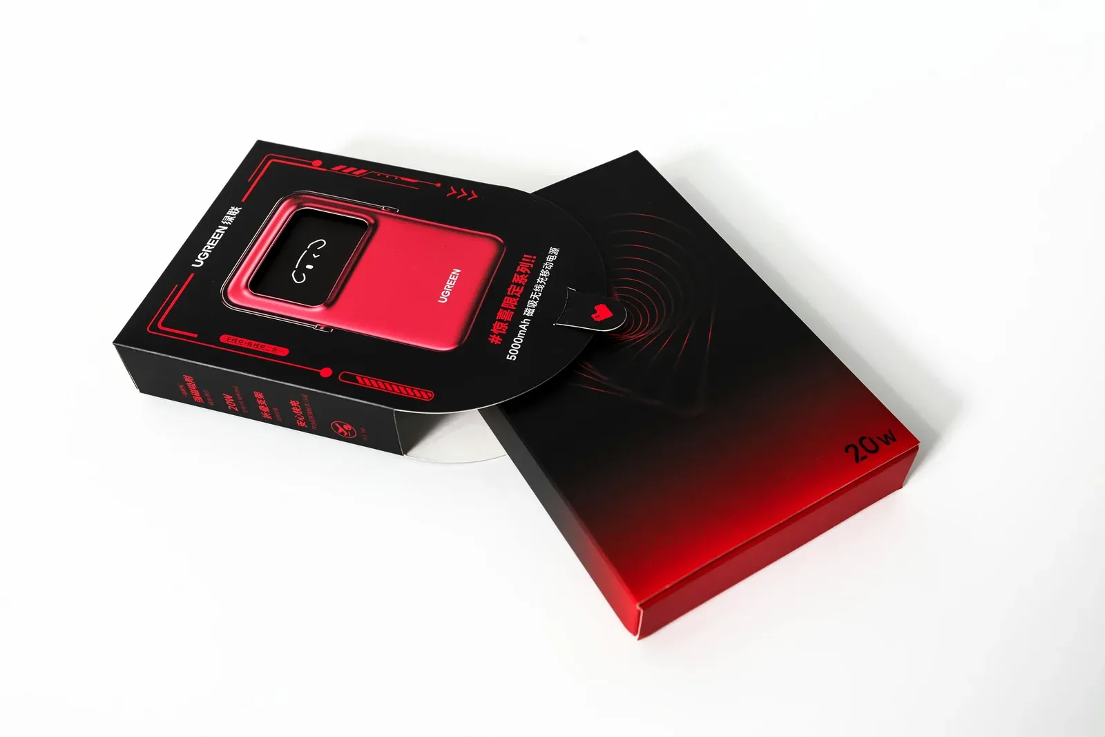 UGREEN magnetic power bank box sliding out of a black and red sleeve