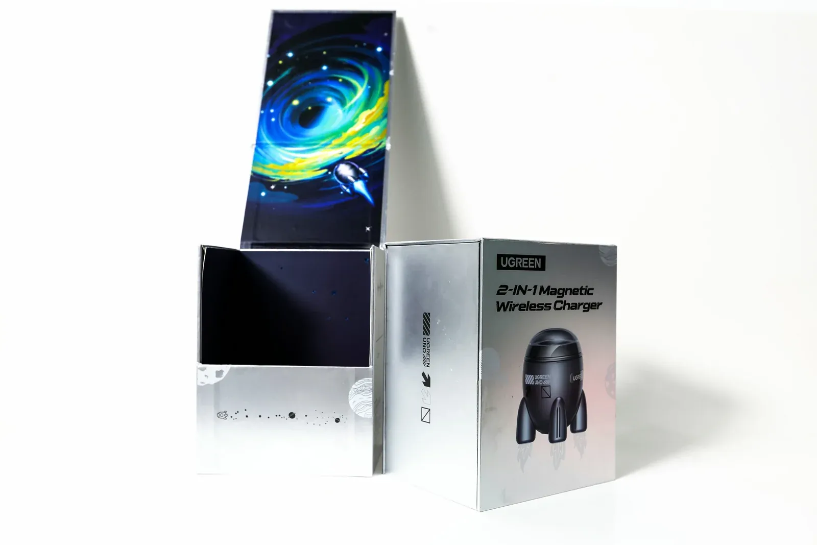UGREEN 2-in-1 magnetic wireless charger box: silver printed outer box with an opened galaxy-print inner box