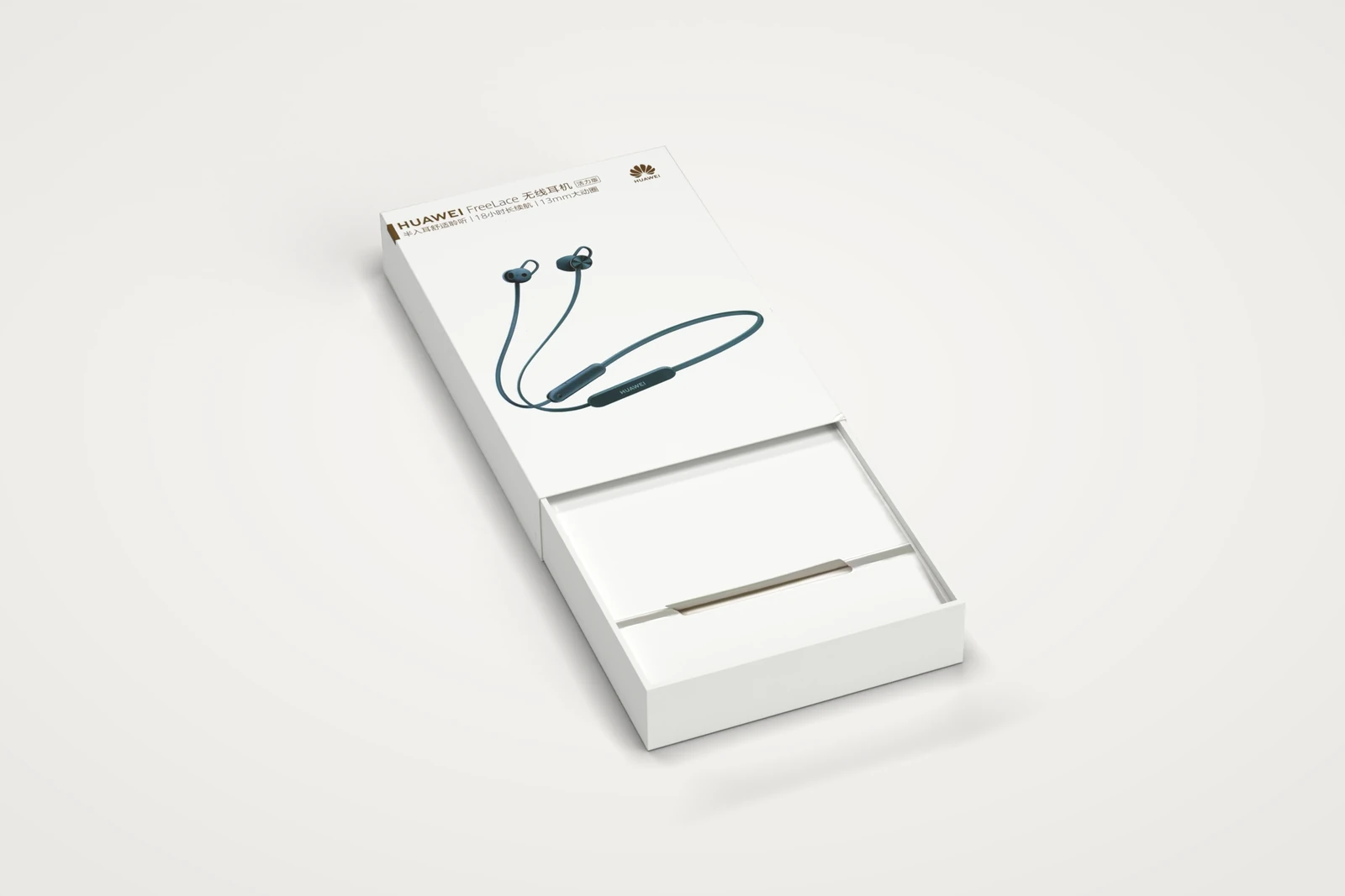 Huawei FreeLace box opened to show the white inner tray and insert