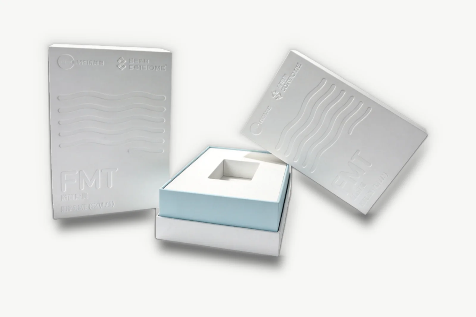 White embossed lid-and-base box with white insert